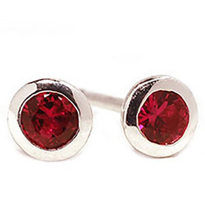 18 Karat White Gold Ruby Bezel Set Stud Earrings - OGI-LTD
